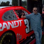 CJ's Trevor Carey with NASCAR driver Justin Alligaier at Growmark FS in Caledonia.