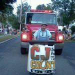 Tradio Trevor swappin' your post parade trash for CJ Tune In Cards at the 2012 Warsaw Fireman's Carnival Parade!