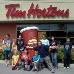 Tim Horton's Camp Day... Every penny of every cup of coffee you purchased that day at Tim Horton's went to send kids to camp- Here's CJ Morning Dude Trevor Carey and some happy campers!!
